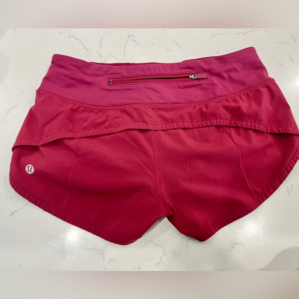 lululemon shorts free to be size 2 in seam 2.5; color maroon